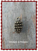 Charm pine cone bronze